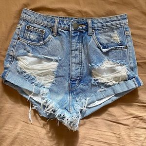 Distressed denim shorts